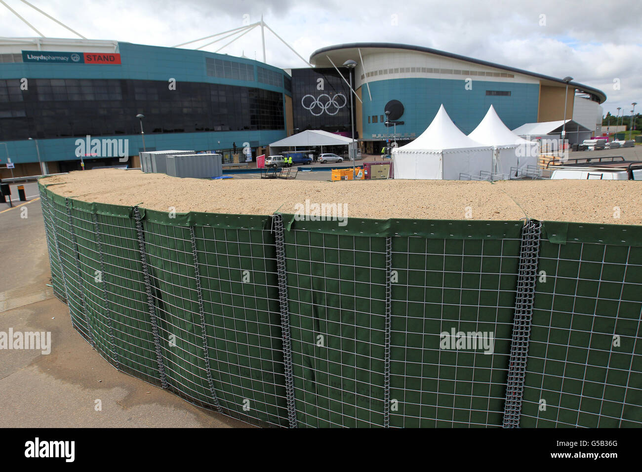 Security sand bags are erected around the perimeter of the Coventry Arena venue which will play host to some of the some of the Olympic football. Press Association Photo. Tuesday July 12, 2012. Picture credit PA Wire Stock Photo