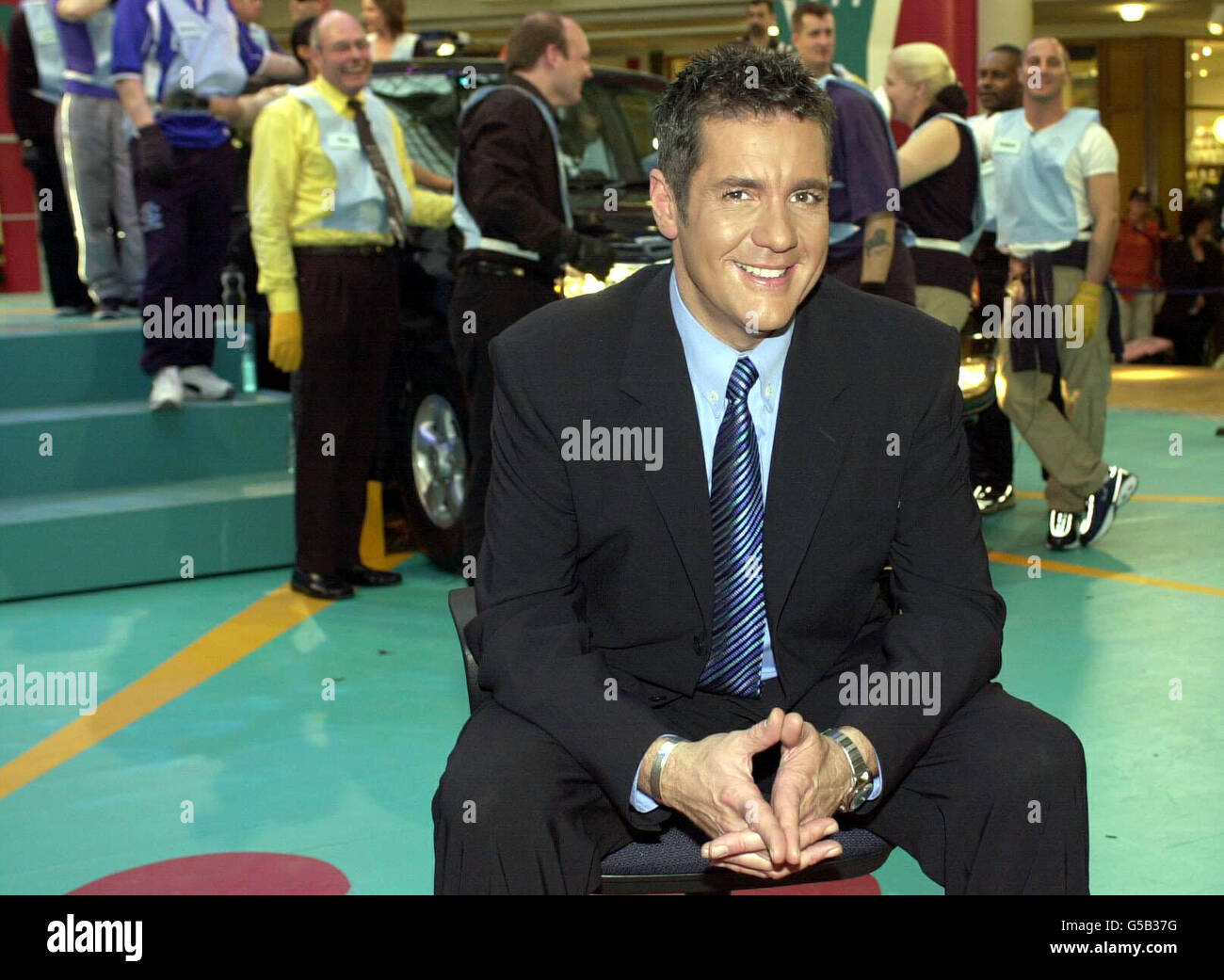 Is the who keeps their hand on it for longest hires stock photography