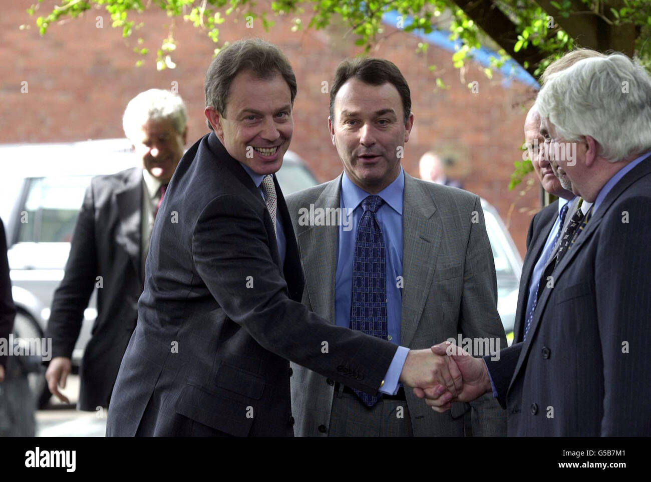 British Prime Minister Tony Blair leaves news conference at the Three Salmons Hotel in the Monmouthshire town of Usk during a brief visit to South Wales. As he went inside for a meeting with farmers' leaders and tourism officials he was booed by a handful of passers-by. * Earlier, he was briefed by the Army, police and Welsh Assembly officials in the 24-hour operation centre set up at the Welsh Assembly in Cardiff to deal with the crisis. He was told of the three areas where the outbreaks are concentrated, Anglesey, Powys and Monmouthshire. Stock Photo