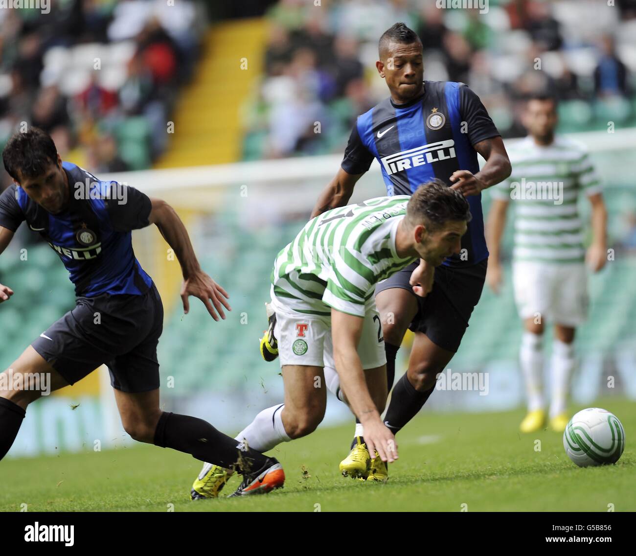 Celtic's Adam Mathew battles with Inter Milan's Fredy Guarin and Matias Silvestre during the Pre-Season Friendly at Celtic Park, Glasgow. PRESS ASSOCIATION Photo. Picture date: Saturday July 28, 2012. See PA story SOCCER Celtic. Photo credit should read: Craig Halkett/PA Wire Stock Photo