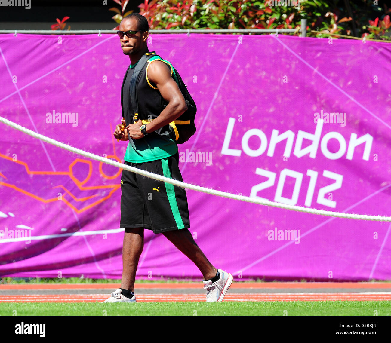 Members Of The Jamaican Track And Field Team Roxroy Cato During The