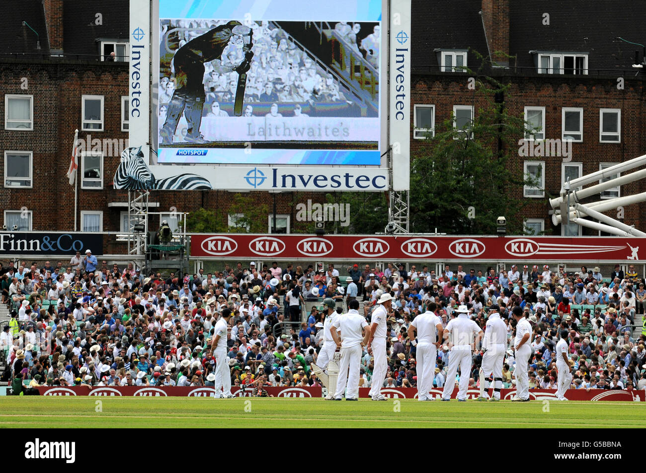 England players watch a 'hot-spot' review on the giant screen Stock Photo