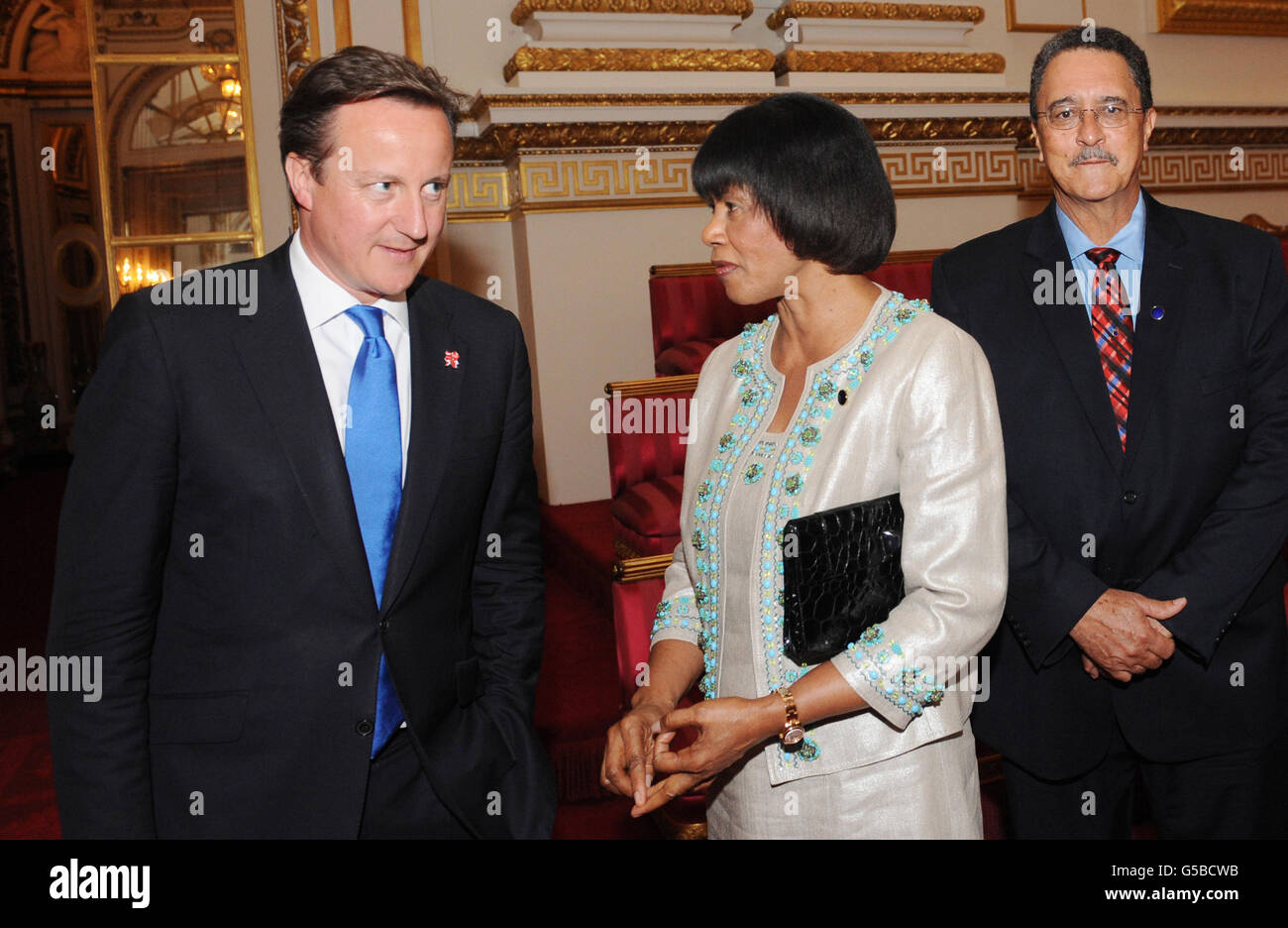Prime Minister David Cameron chats with Prime Minister of Jamaica