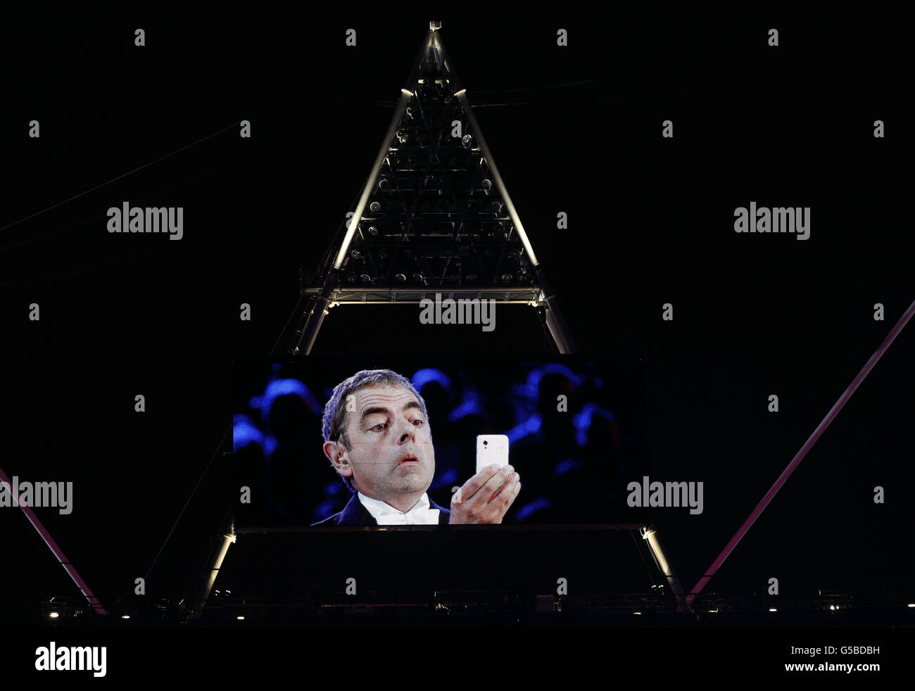 Actor Rowan Atkinson plays Mr Bean on stage of the London Olympic Games 2012 Opening Ceremony at the Olympic Stadium, London. Stock Photo