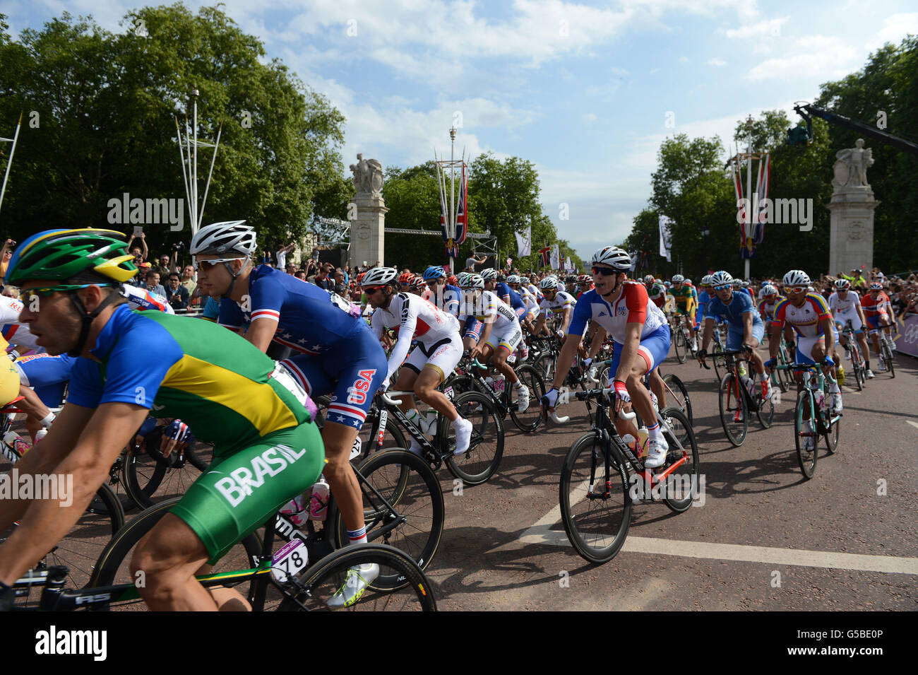 London Olympic Games Day 1. The peloton cycle down The Mall in