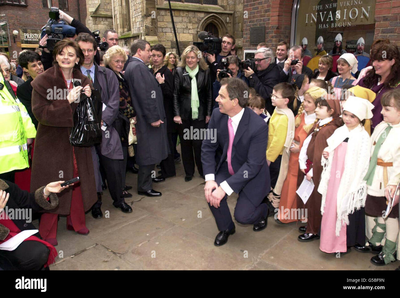 Britain's Prime Minister Tony Blair has his picture taken with school children from St Georges Roman Catholic Primary School in York, dressed as Vikings outside the Jorvik Centre in York. * Mr Blair was visiting the viking museum during a day long-visit to Yorkshire to boost British tourism following the foot and mouth oubreak. The trip was part of a concerted effort by the Government to prove to the world that Britain is open for business despite the foot-and-mouth crisis, which has now reached 1,041 premises in the UK. Stock Photo