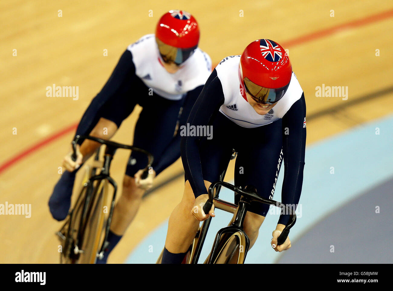 Great Britain's Jessica Varnish and Victoria Pendleton in the Women's Team Sprint at the Velodrome in the Olympic Park, London, on the sixth day of the London 2012 Olympics. Stock Photo