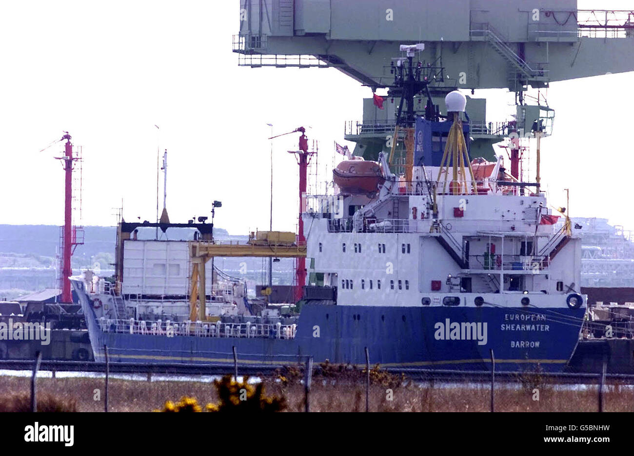 The BNFL ship European Shearwater at Barrow-In-Furness in Cumbria, holding a shipment of German spent nuclear fuel which is set to begin reprocessing at Sellafield nuclear plant in Britain this week for the first time in three years. *The German shipment follows on from the recent safe and successful re-start of transports from the Dodewaard reactor in The Netherlands. Used nuclear fuel has been transported between Germany and Sellafield since 1972. Stock Photo