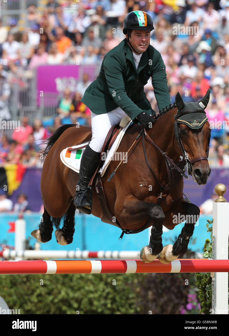 Ireland's Cian O'Connor rides Blue Loyd 12 during the Equestrian Team Jumping, at Greenwich Park, during day ten of the London 2012 Olympics. Stock Photo