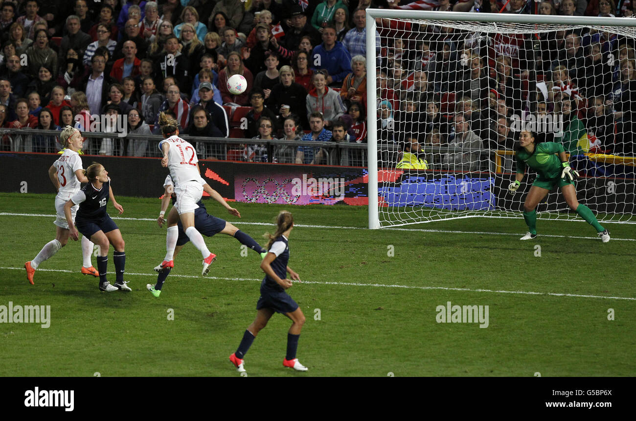 London Olympic Games - Day 10. Canada's Christine Sinclair scores the third goal to make it 3-2 during the Olympic match at Old Trafford. Stock Photo
