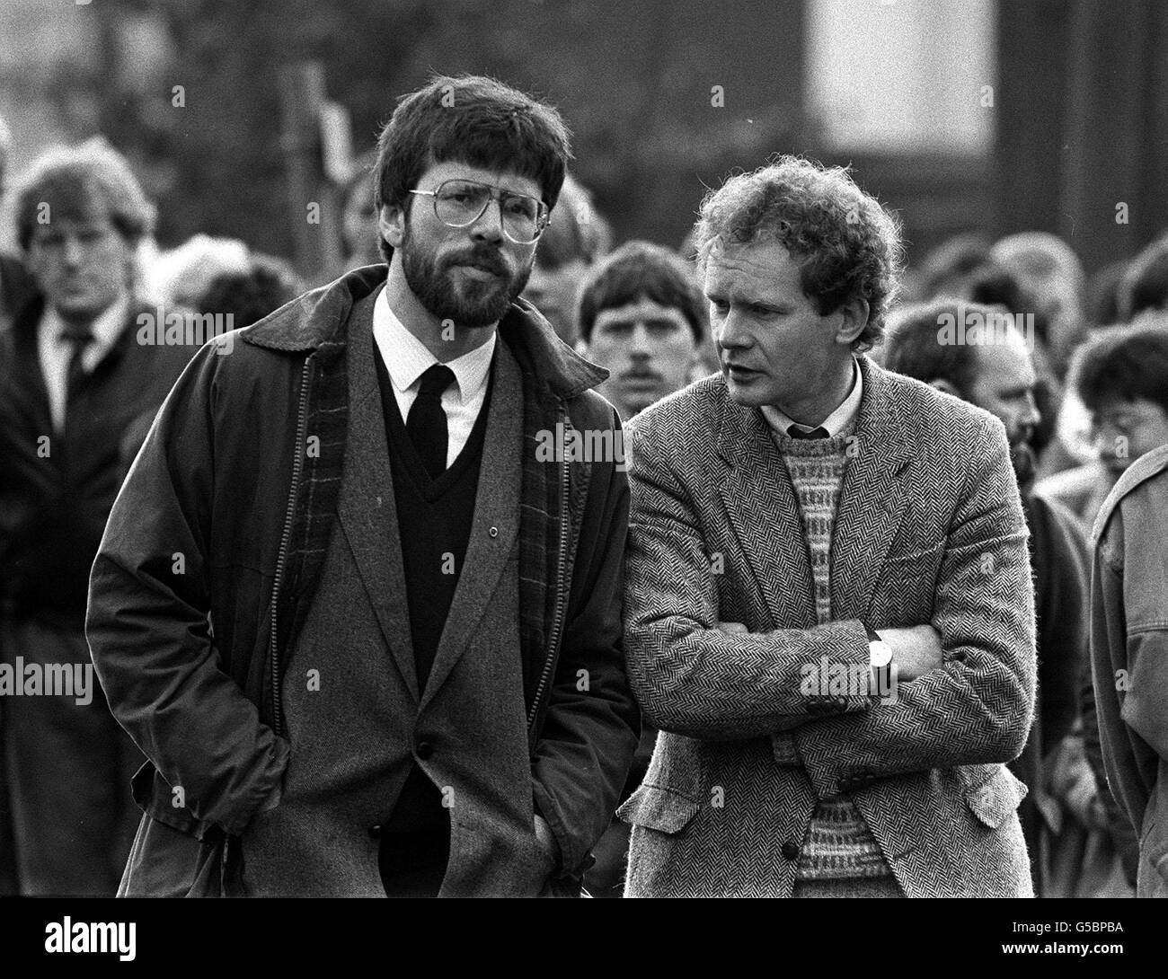 President of Sinn Fein, Gerry Adams and West Belfast MP Martin McGuinness (right) at the funeral of Patrick Kelly, 30, the reputed IRA commander in East Tyrone. Stock Photo