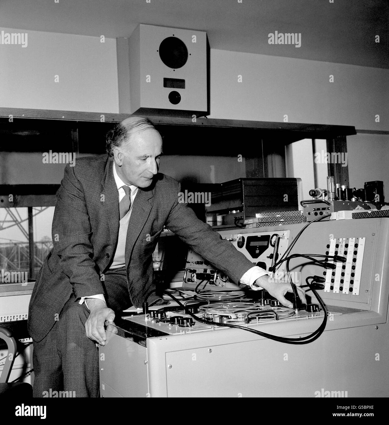 Professor Sir Bernard Lovell, Director of Jodrell Bank (Cheshire) - where the giant radio telescope is situated - in the control room there listening for signals from the Russian manned space-ship announced to be in orbit around the earth. Stock Photo