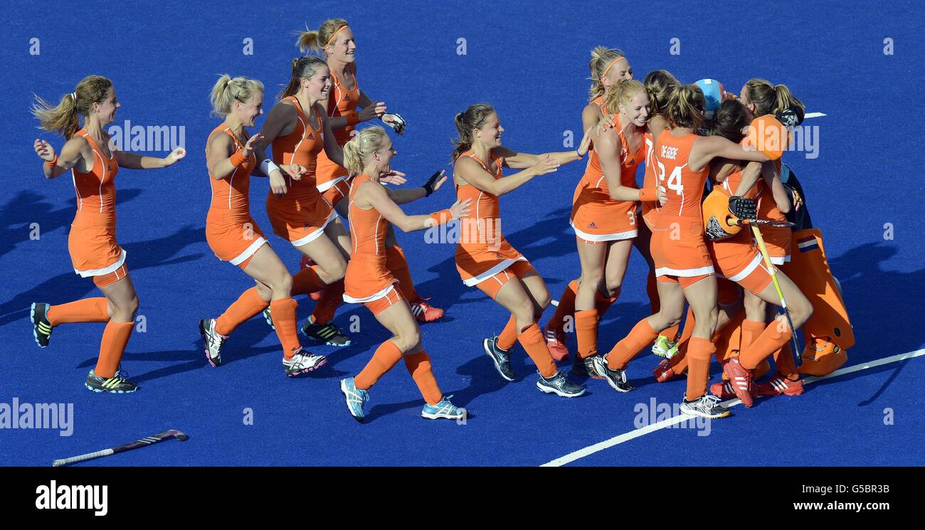 Nertherland's team celebrate after winning the shoot out against New Zealand during the Women's Hockey Semi-Final at the Riverbank Arena, on the twelfth day of the London 2012 Olympics. Stock Photo