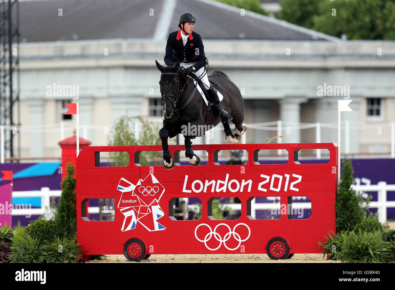 Great Britain's Ben Maher riding Tripple X in the Equestrian Jumping Individual Final Round B at Greenwich Park, on the twelfth day of the London 2012 Olympics. Stock Photo