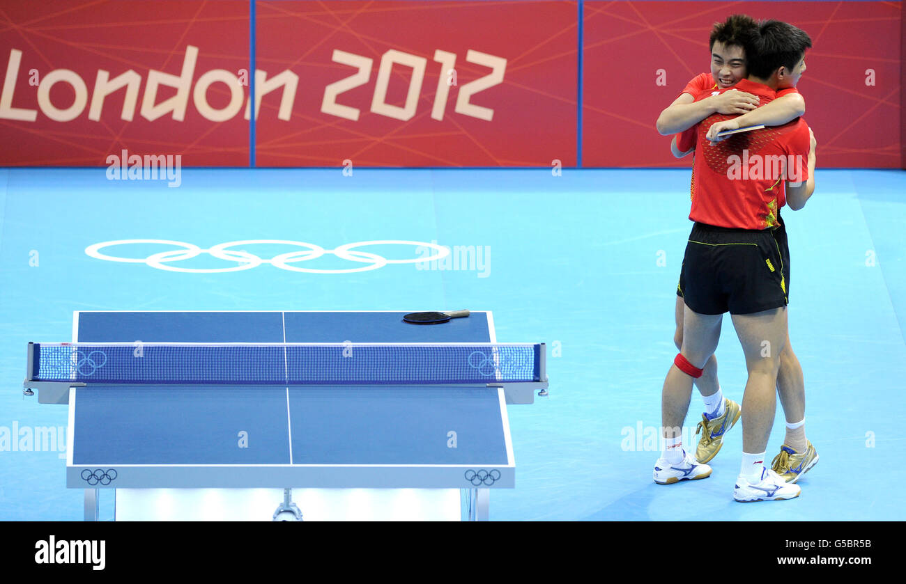 China's Wang Hao (left) and Zhang Jike celebrate as they defeat the Republic of Korea's Oh Sangeun and Ryu Seungmin during the Table Tennis team final at the ExCel centre, London. Stock Photo