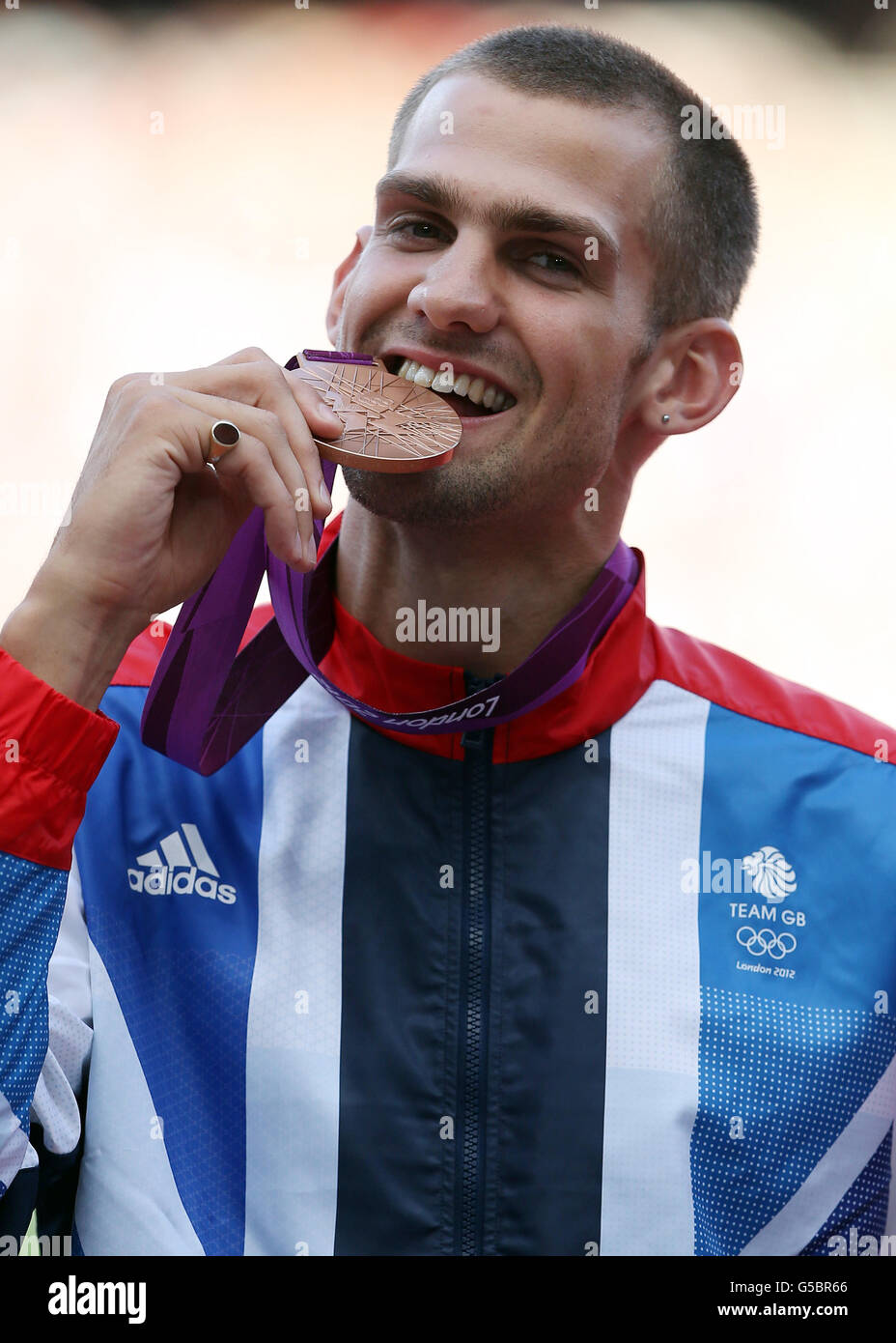 Great Britain's Bronze Medalist Robert Grabarz at the Men's High Jump medal presentation, on the twelfth day of the London 2012 Olympics. Stock Photo