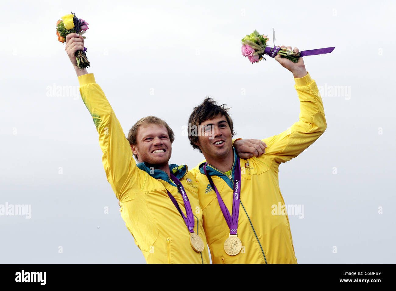 Australia's Nathan Outteridge and Iain Jensen (left) celebrate their Olympic Gold Medal in the 49er at Weymouth today. Stock Photo