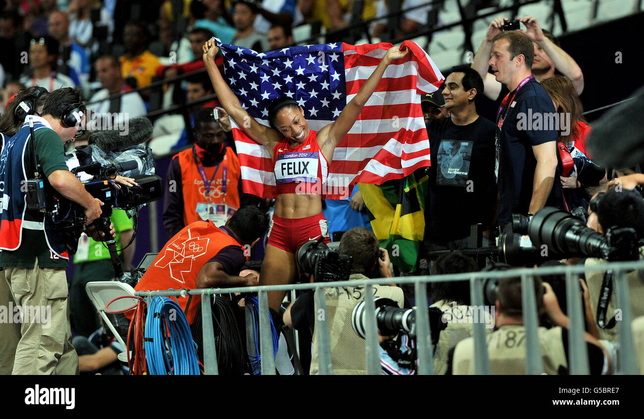 USA's Allyson Felix celebrates winning the gold medal after the Women's 200m, on the 12th day of the London 2012 Olympics at The Olympic Stadium. Stock Photo