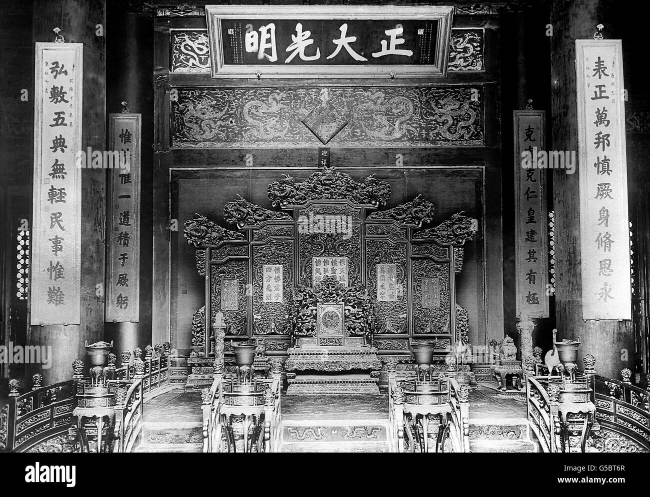 The throne of the former Emperor of China, in the Forbidden City in Peking. Stock Photo