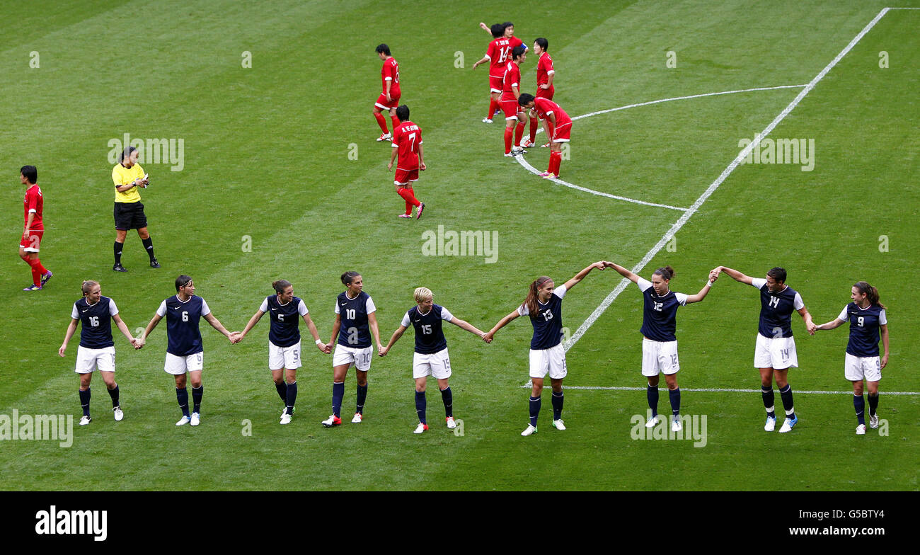 United States Abby Wambach (second right) celebrates scoring the opening goal against North Korea during the First Round, Group G match at Old Trafford, Manchester during the fourth day of the London 2012 Olympics. Stock Photo