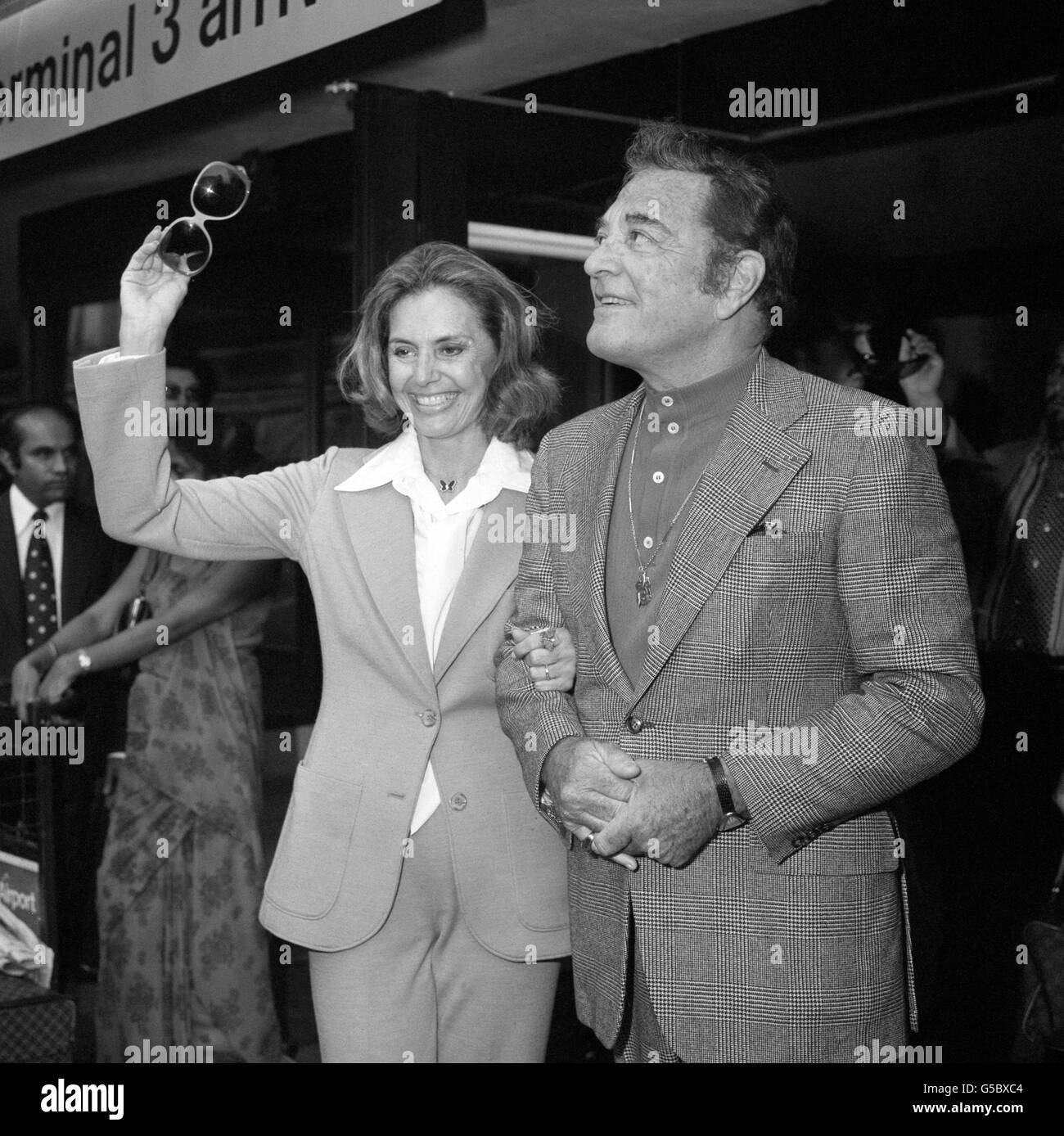 Hollywood star Cyd Charisse, who appeared in films such as 'Singing in the Rain' and 'Silk Stockings', arrives at Heathrow Airport, London from New York with her singing star husband Tony Martin. The Husband and wife team are to appear at the London Palladium for a week. Stock Photo