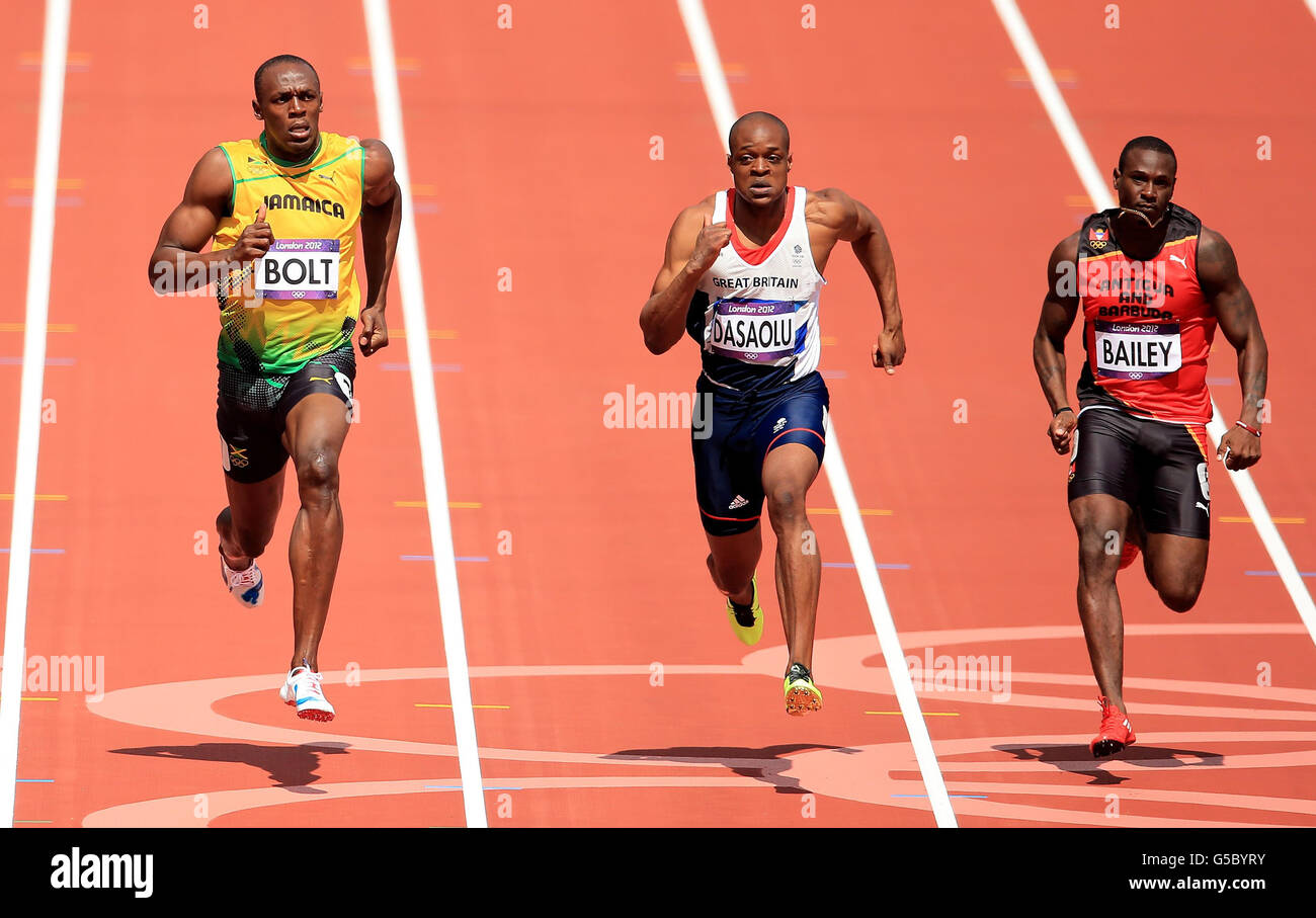 Jamaica S Usain Bolt Left Runs Next To Great Britain S James Dasaolu Centre And Antigua S