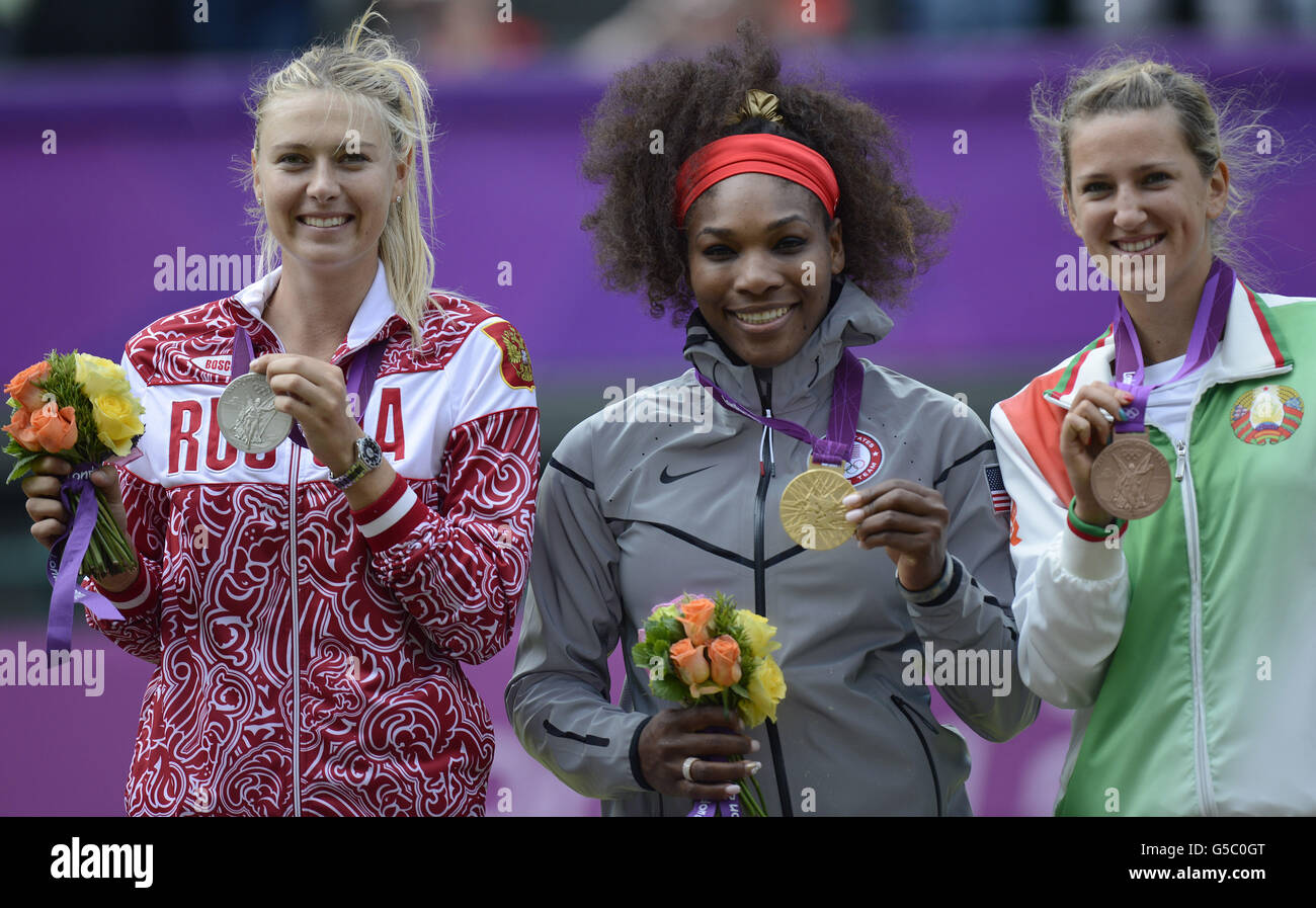 USA's Serena Williams (centre) with her Olympic Gold Medal, Russia's