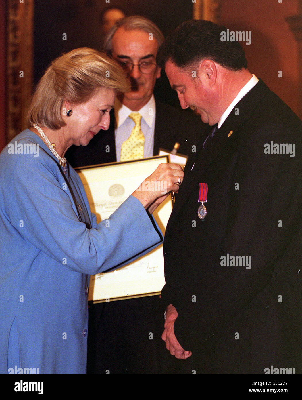 HRH Princess Alexandra, President of the Royal Humane Society, presents the Society's Stanhope Gold Medal 2000, to David Calnan, from Yukon, Canada, at a ceremony in London. * Mr Calnan, a landscape gardener, was awarded the medal for a supreme act of bravery in saving a young woman from attack by a grizzly bear. Stock Photo