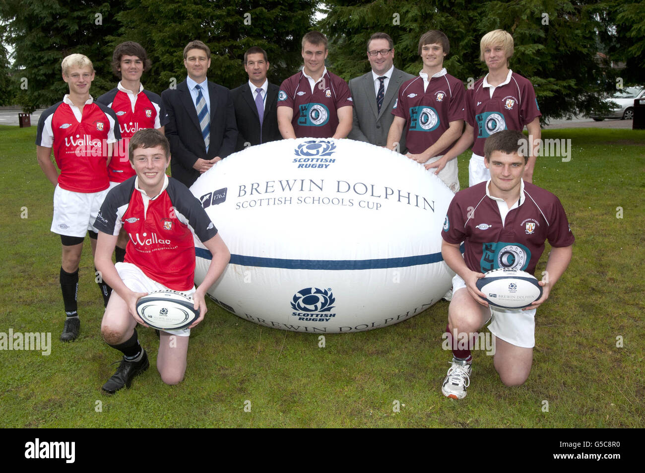 Standing (left to right) Ben Hessell, Jack Christie, Head of Clubs and Schools Nick Rennie, Scottish Rugby Union's Angus Wallace, Barry Shepherd, Brewin Dolphin's Ton Christie, Eddie Hessell with Scott Murray (front left) and John Crilly (front right) during a Photocall at Banchory Academy, Banchory. Stock Photo