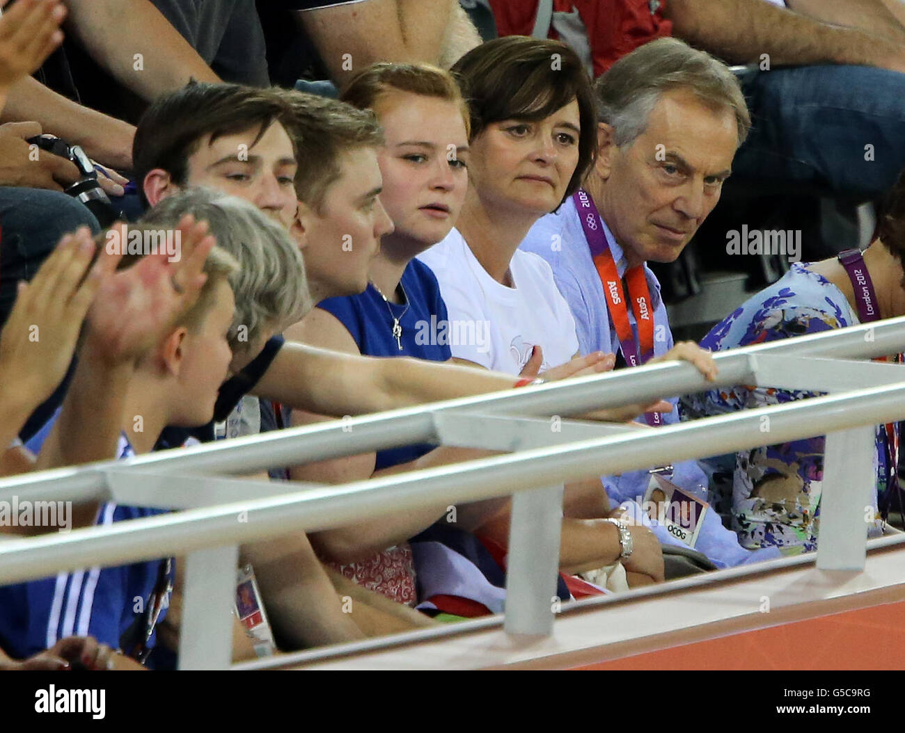 Former Prime Minister Tony Blair with his wife Cherie and family watch