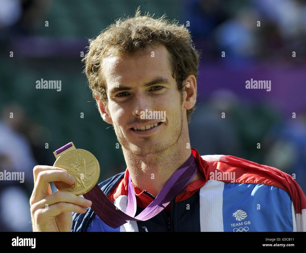 Great Britain's Andy Murray with his Olympic Gold Medal, after winning