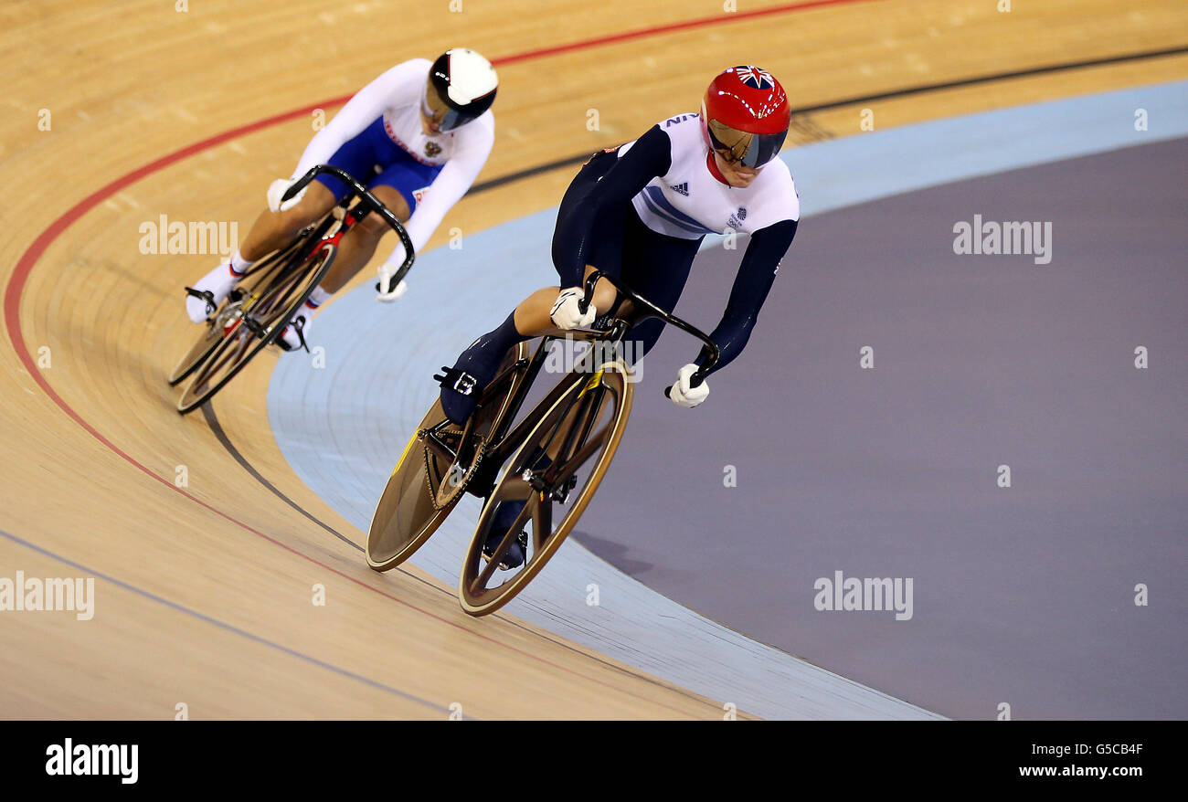 Great Britain's Victoria Pendleton (right) during her victory against Russia's Ekaterina Gnidenko in the Women's Sprint 1/16 Finals at the Velodrome in the Olympic Park during day nine of the London 2012 Olympics. Stock Photo