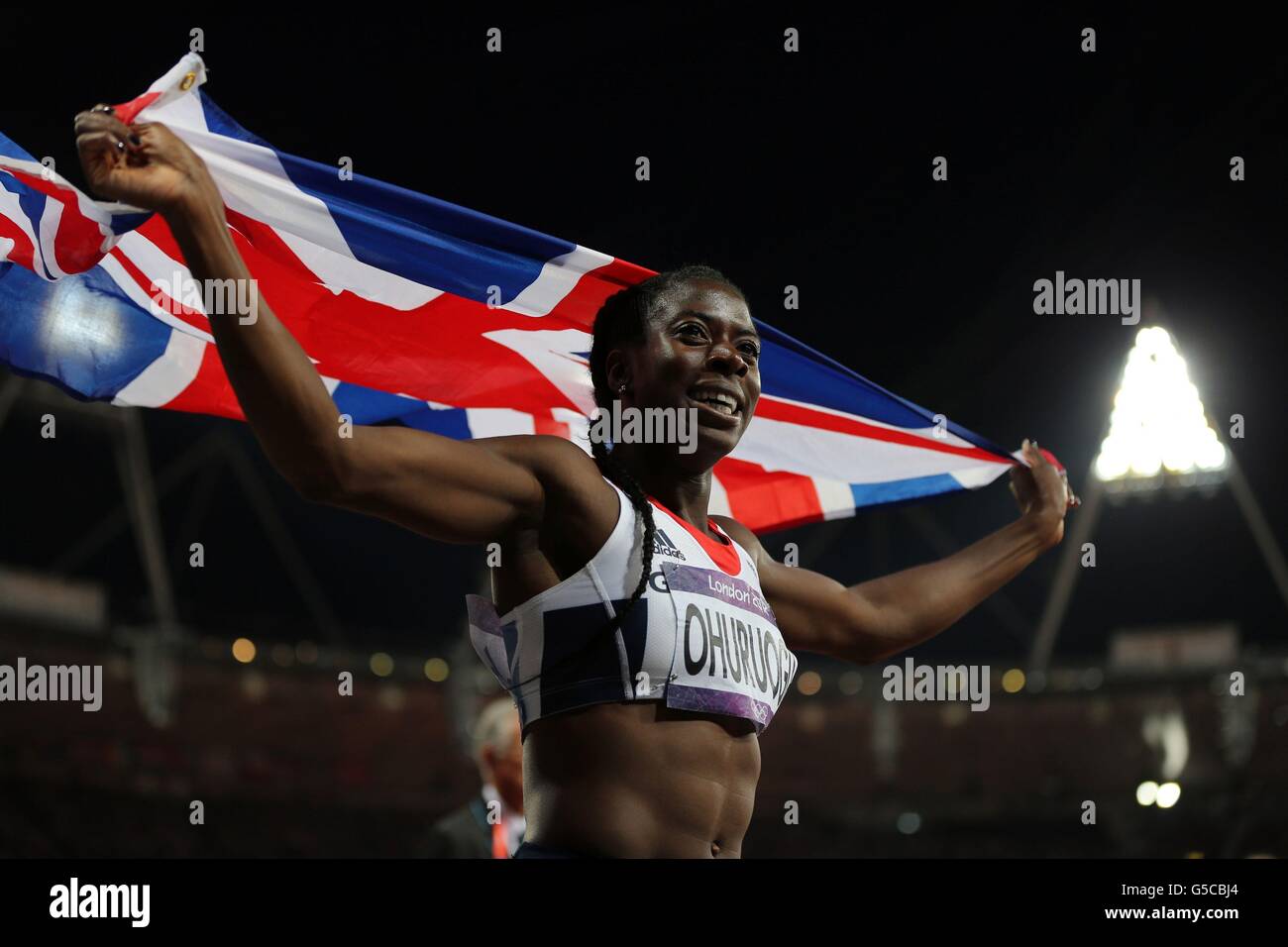 London Olympic Games - Day 9. Great Britain's Christine Ohuruogu celebrates her silver medal in the Women 400m Final at Olympic Stadium, London. Stock Photo