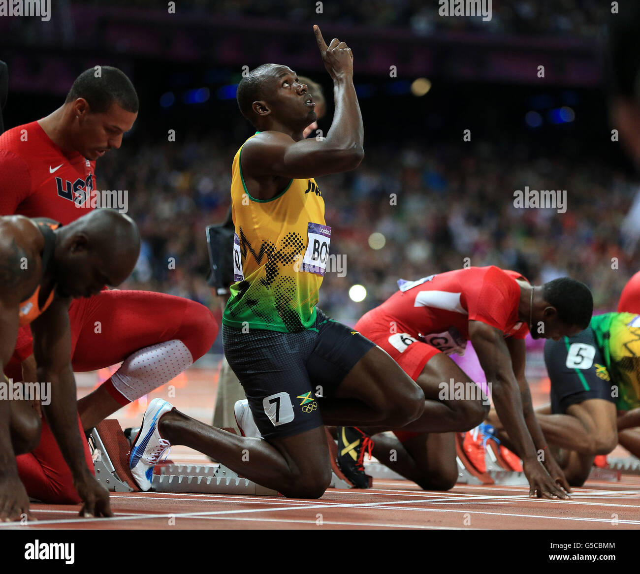 London Olympic Games Day 9. Jamaica's Usain Bolt points to the sky at