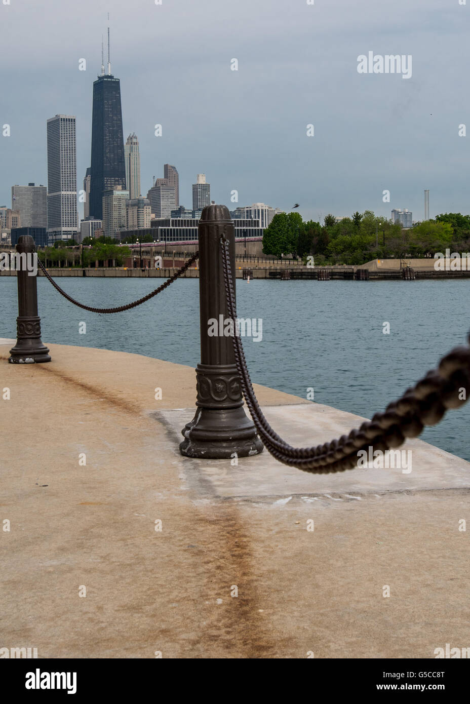 Railing Post on Navy Pier with Chicago Skyline in Background Stock Photo