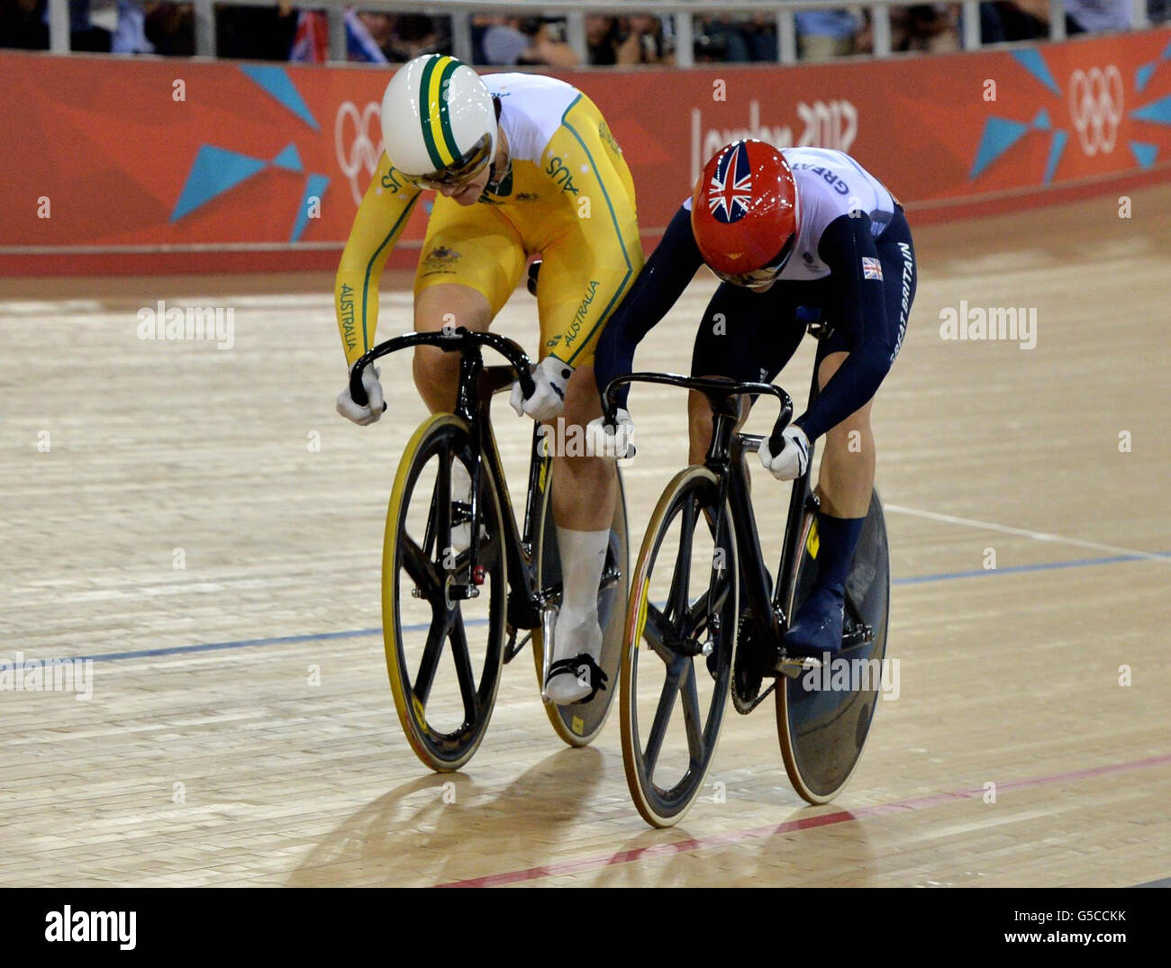 Great Britain's Victoria Pendleton (right) is nudged in her first Final with Australia's Anna Meares on day Eleven of the Olympic Games at the Velodrome in London. Stock Photo