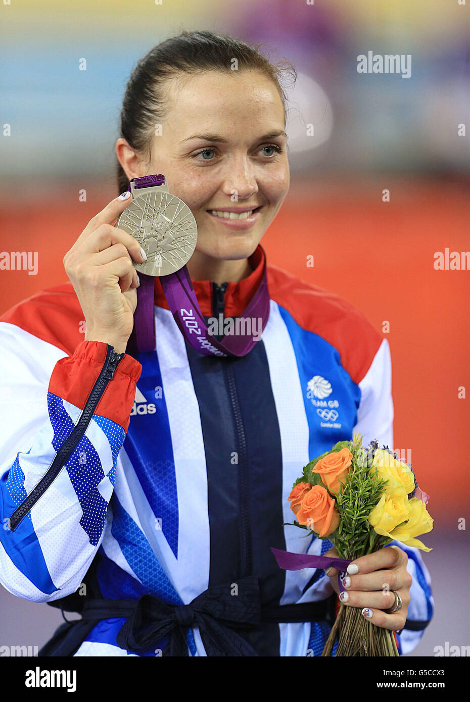 Great Britain's Victoria Pendleton celebrates with her Silver Medal after winning silver in the Women's Sprint in the Velodrome at the Olympic Park, on the eleventh day of the London 2012 Olympics. Stock Photo