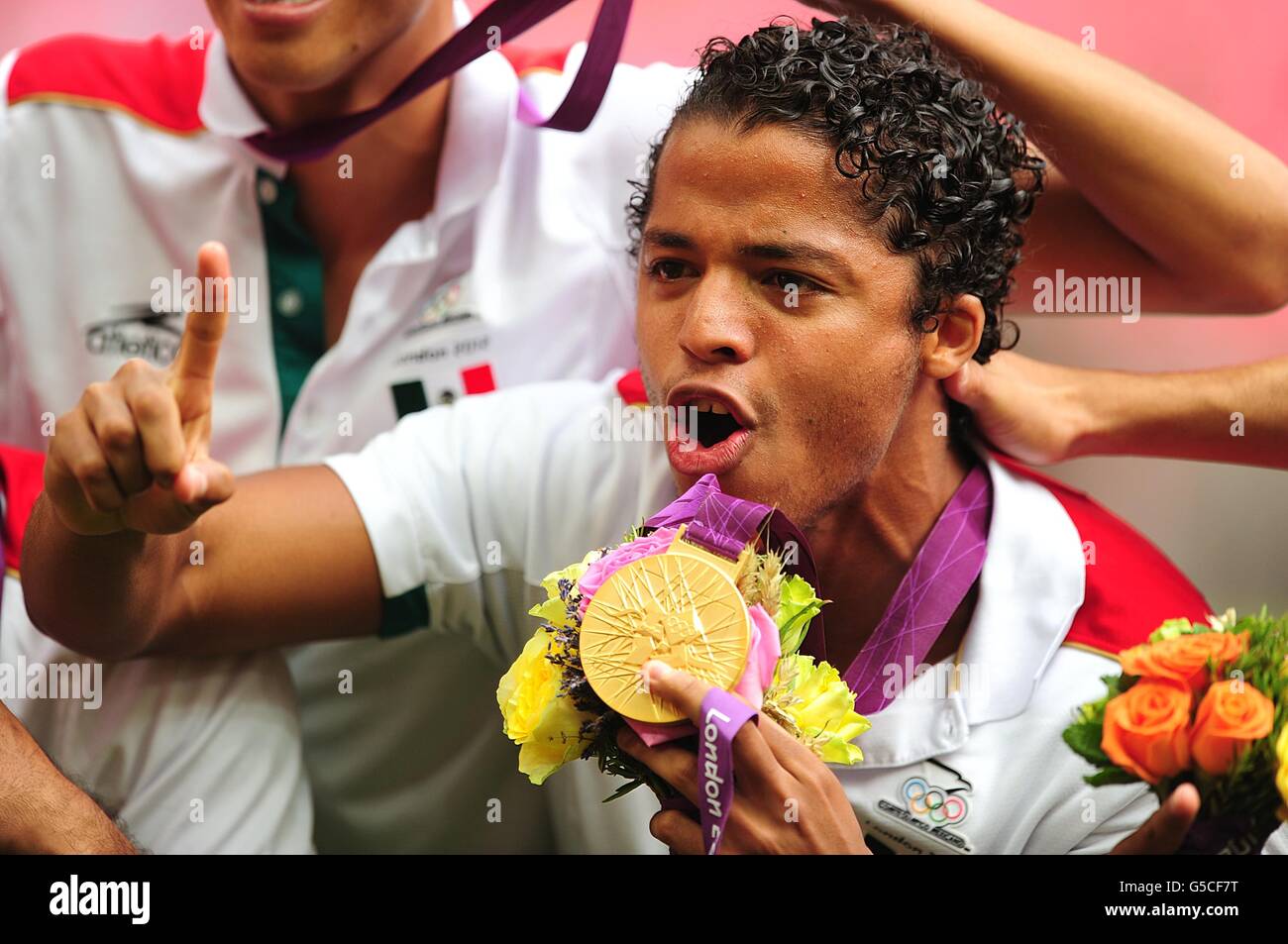 Mexico's Giovani Dos Santos celebrates victory in the Football Men's Gold Medal Match between Mexico and Brazil at Wembley Stadium, on day 15 of the London 2012 Olympics. Stock Photo