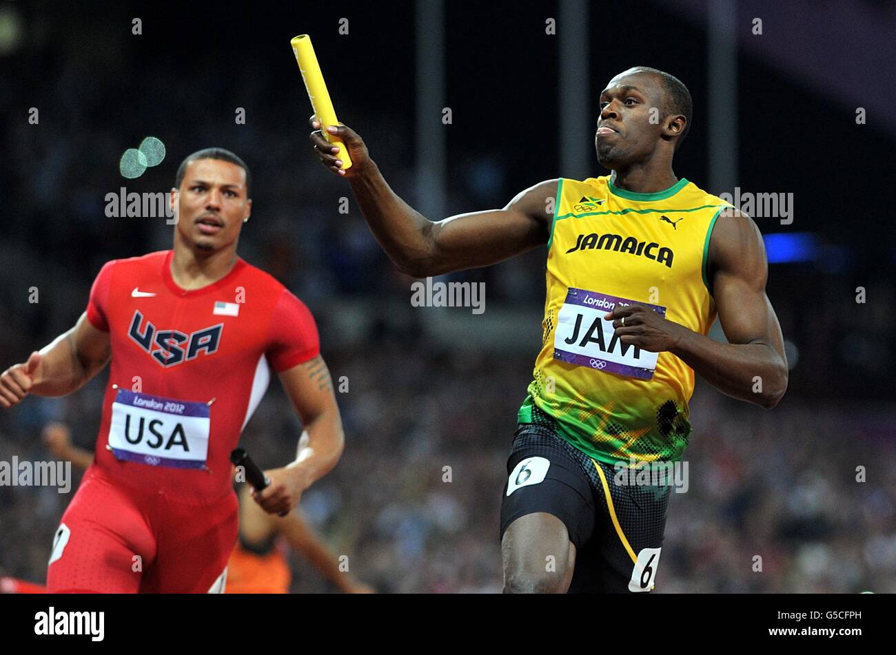 Jamaica's Usain Bolt crosses the finish line as his team win the Men's