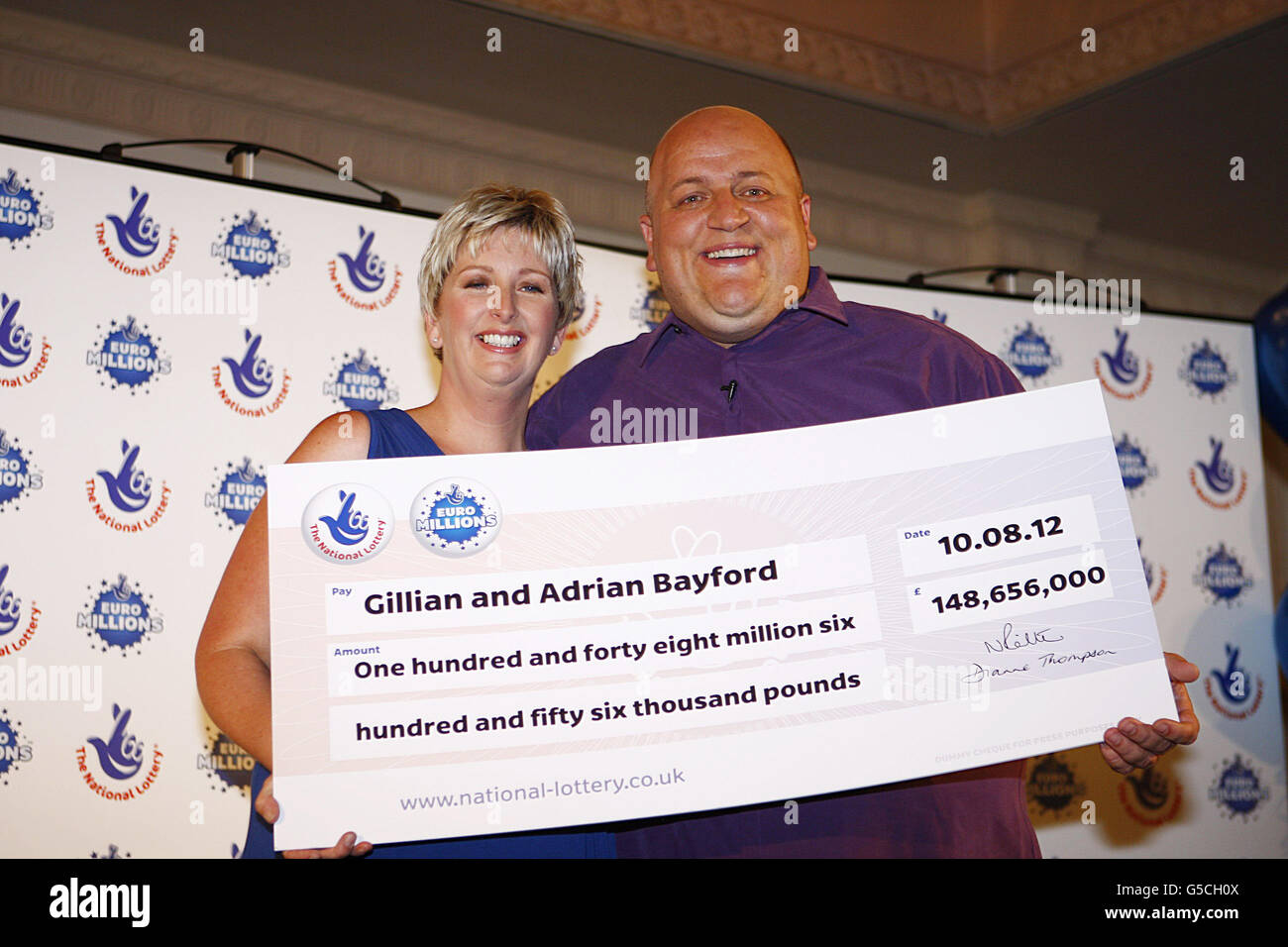 Adrian Bayford, 41, and wife Gillian, 40, from Haverhill, Suffolk, during a press conference at Down Hall Country House Hotel in Hatfield Heath, Hertfordshire, after they won &pound;148.6 million on Friday's EuroMillions jackpot. Stock Photo