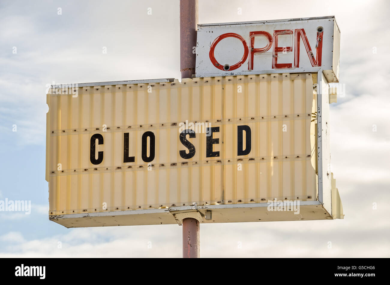 Signs showing both open and closed causing confusion Stock Photo