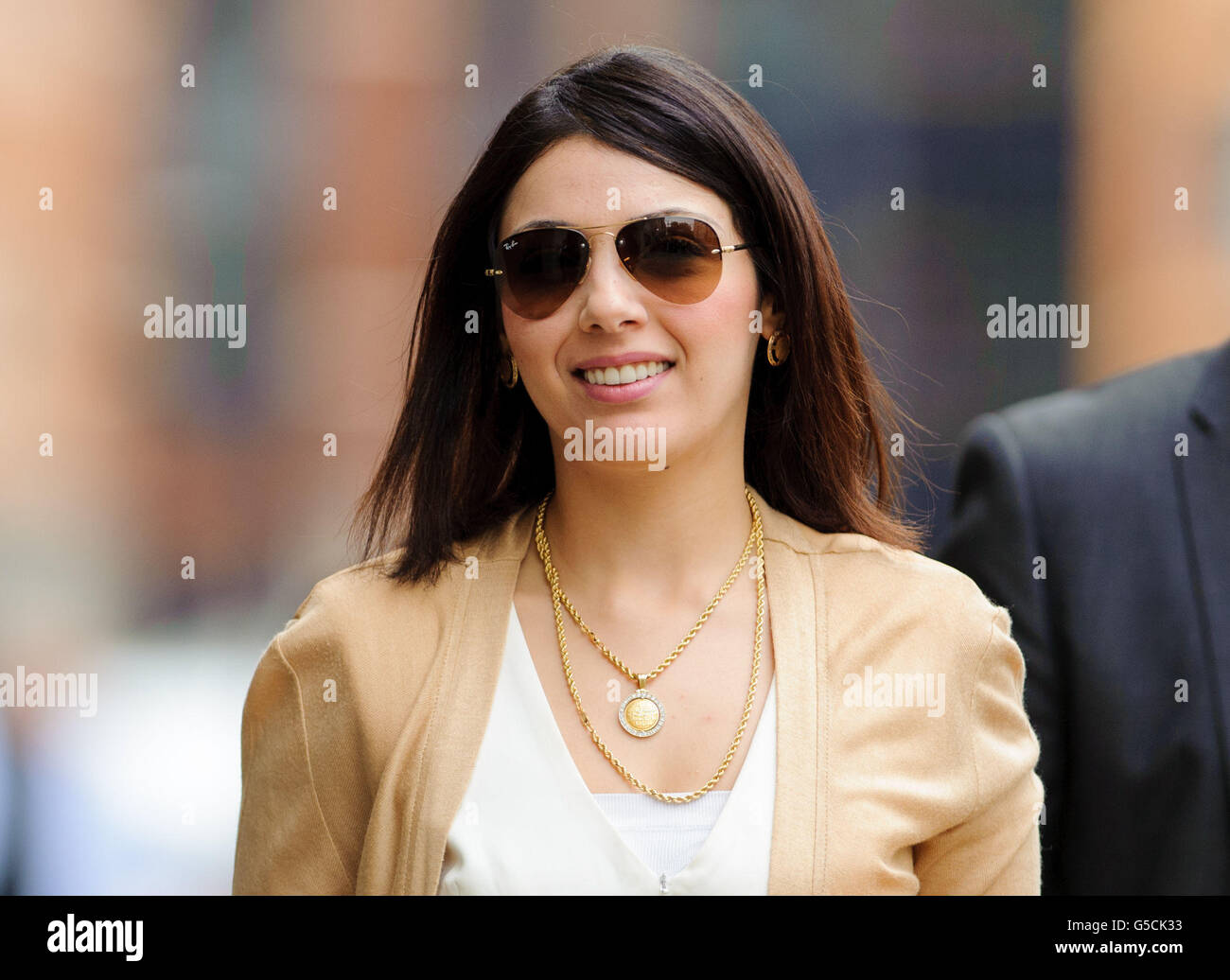 Nur Nadil, the wife of former fugitive tycoon Asil Nadir, arrives at the Old Bailey, central London, as the jury will continue deliberating on nine charges against him today - the day after they left him facing a prison sentence for plundering millions from his Polly Peck business empire. Stock Photo