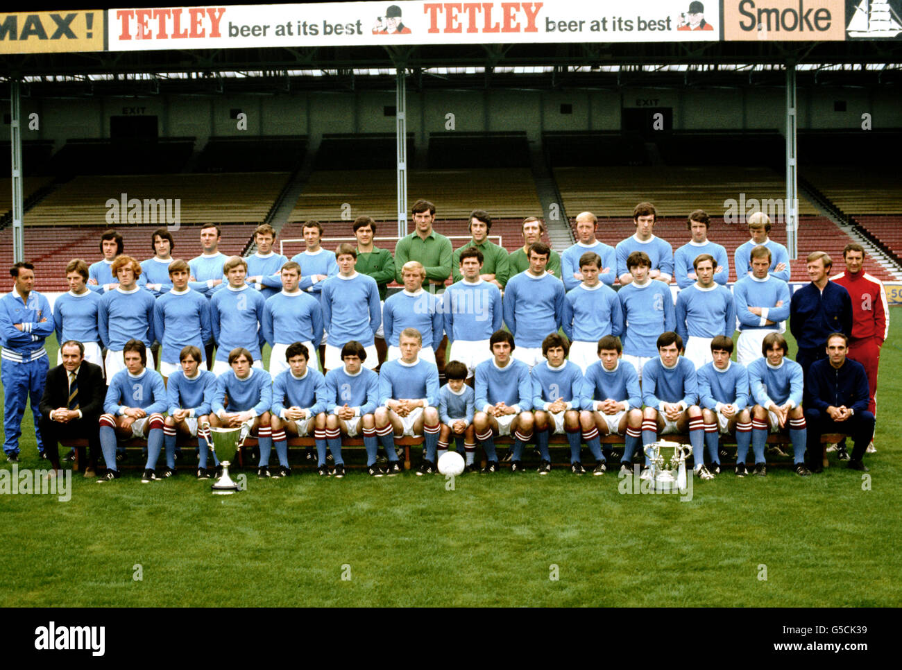 Manchester City team group 1970/71 season with the League and European Cup Winners Cup Trophies Stock Photo