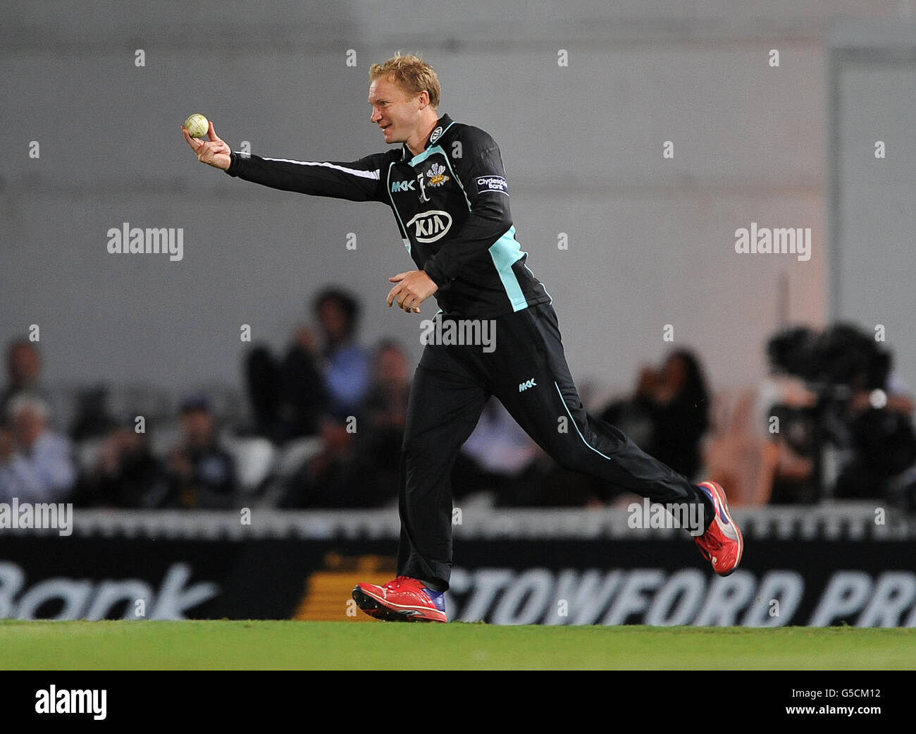 Cricket - Clydesdale Bank 40 - Group B - Surrey v Glamorgan - The Kia Oval. Surrey's Gareth Batty celebrates after taking the catch of Glamorgan's Dean Cosker. Stock Photo