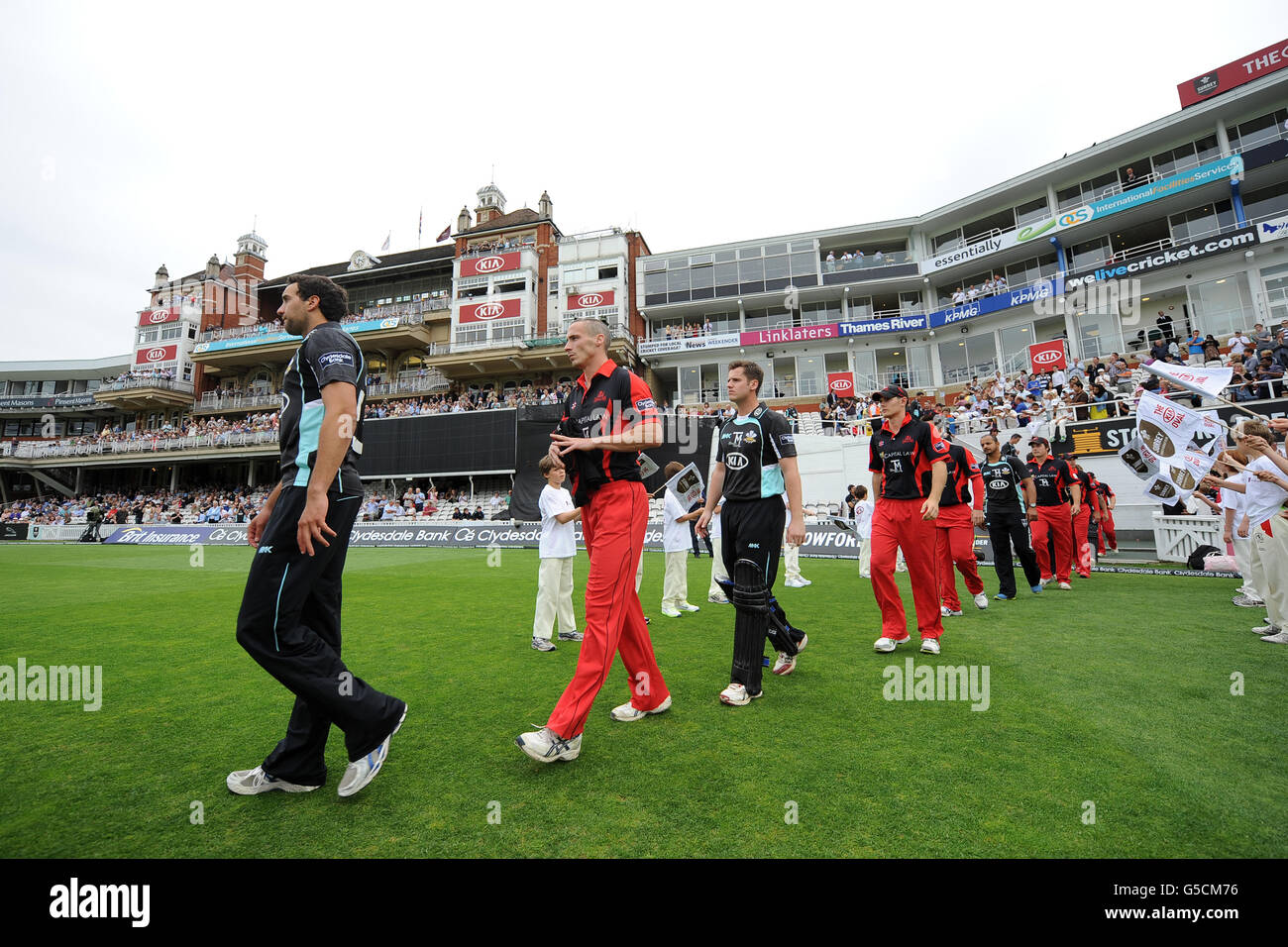 players walk out at the kia oval hires stock photography and