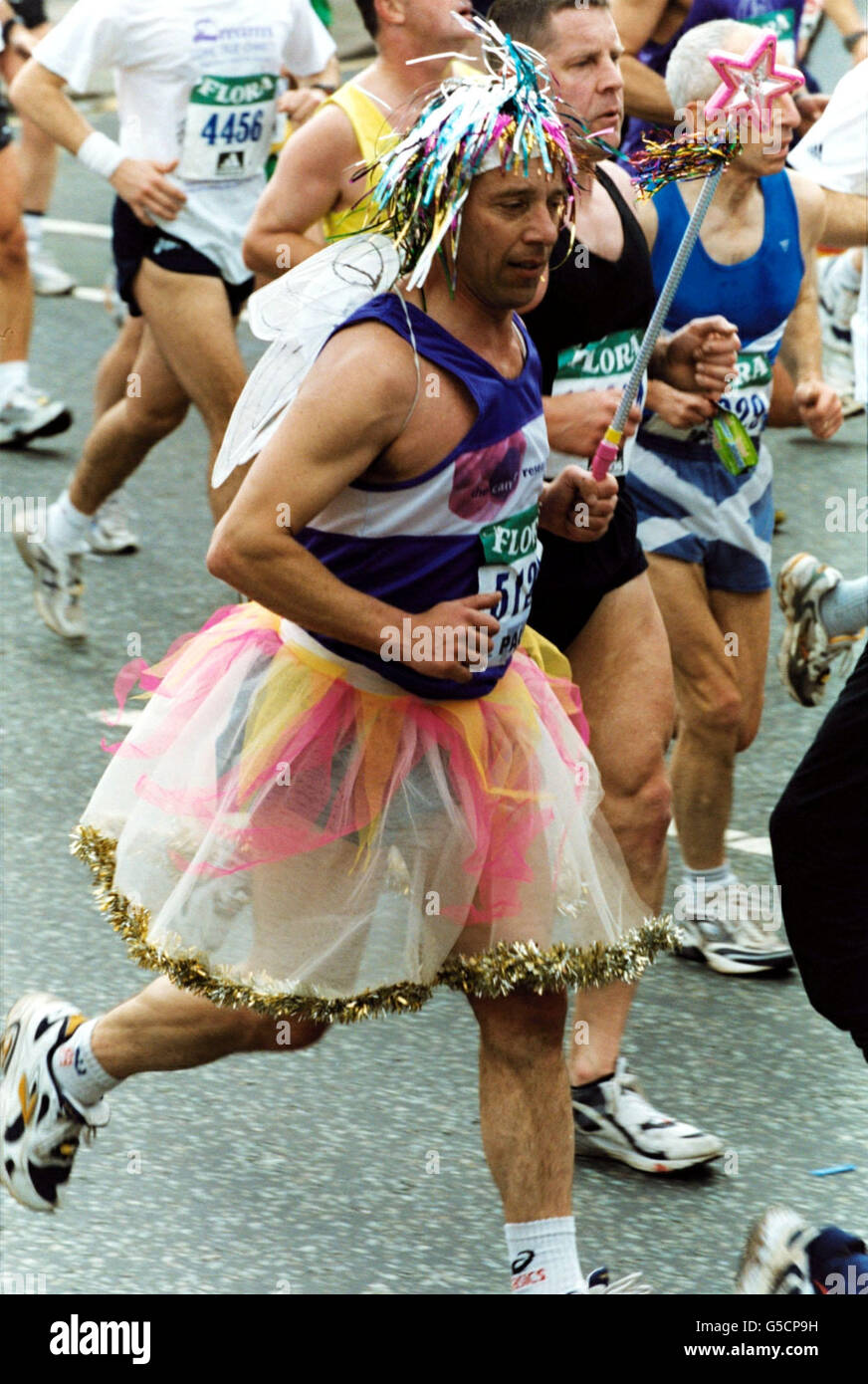Contestant in the 2001 london marathon runs dressed as fairy hires