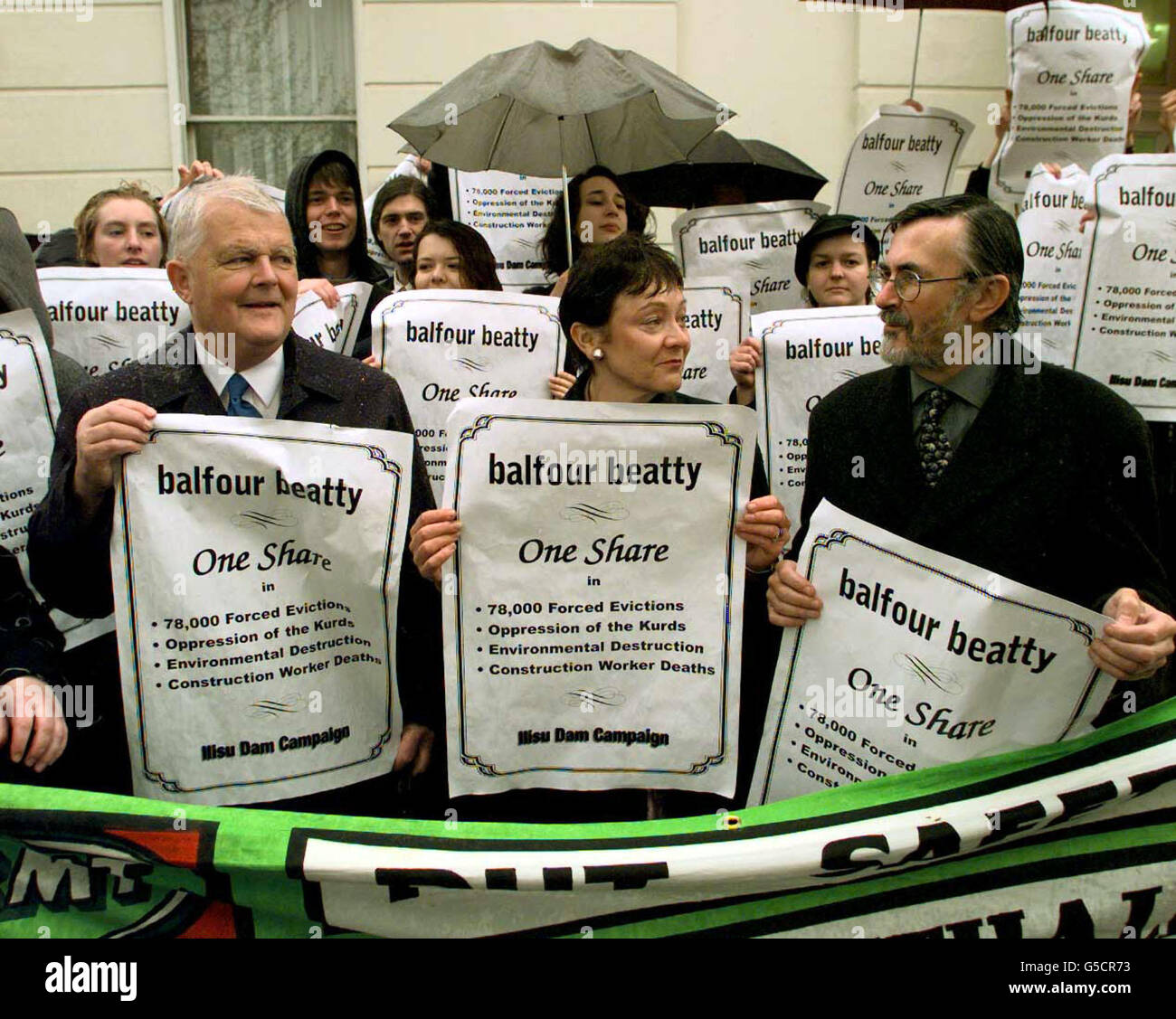 Left to right, Bruce Kent of CND, Liberal Democrat MEP Baroness Sarah Ludford, and John Austin, MP for Erith, at a protest against engineering and construction firm Balfour Beaty - whose annual general meeting was being held today. * The protest took place outside the Royal Lancaster Hotel, Lancaster Gate, London Stock Photo