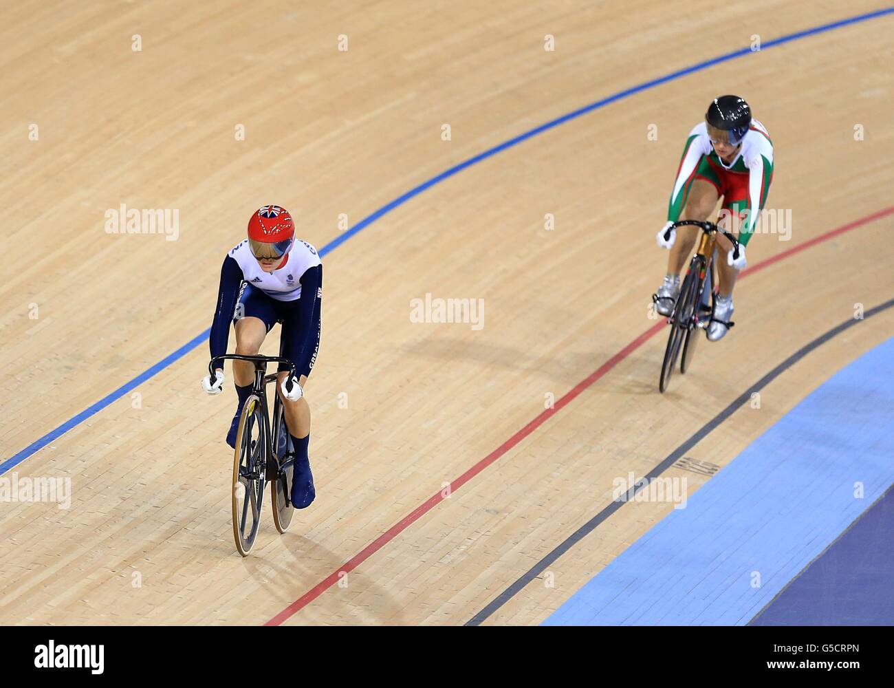 Great Britain's Victoria Pendleton (left) leads Belarus' Olga Panarina during the Womens Sprint Quarter Final Race 1 at the Velodrome in the Olympic Park, on the tenth day of the London 2012 Olympics. Stock Photo