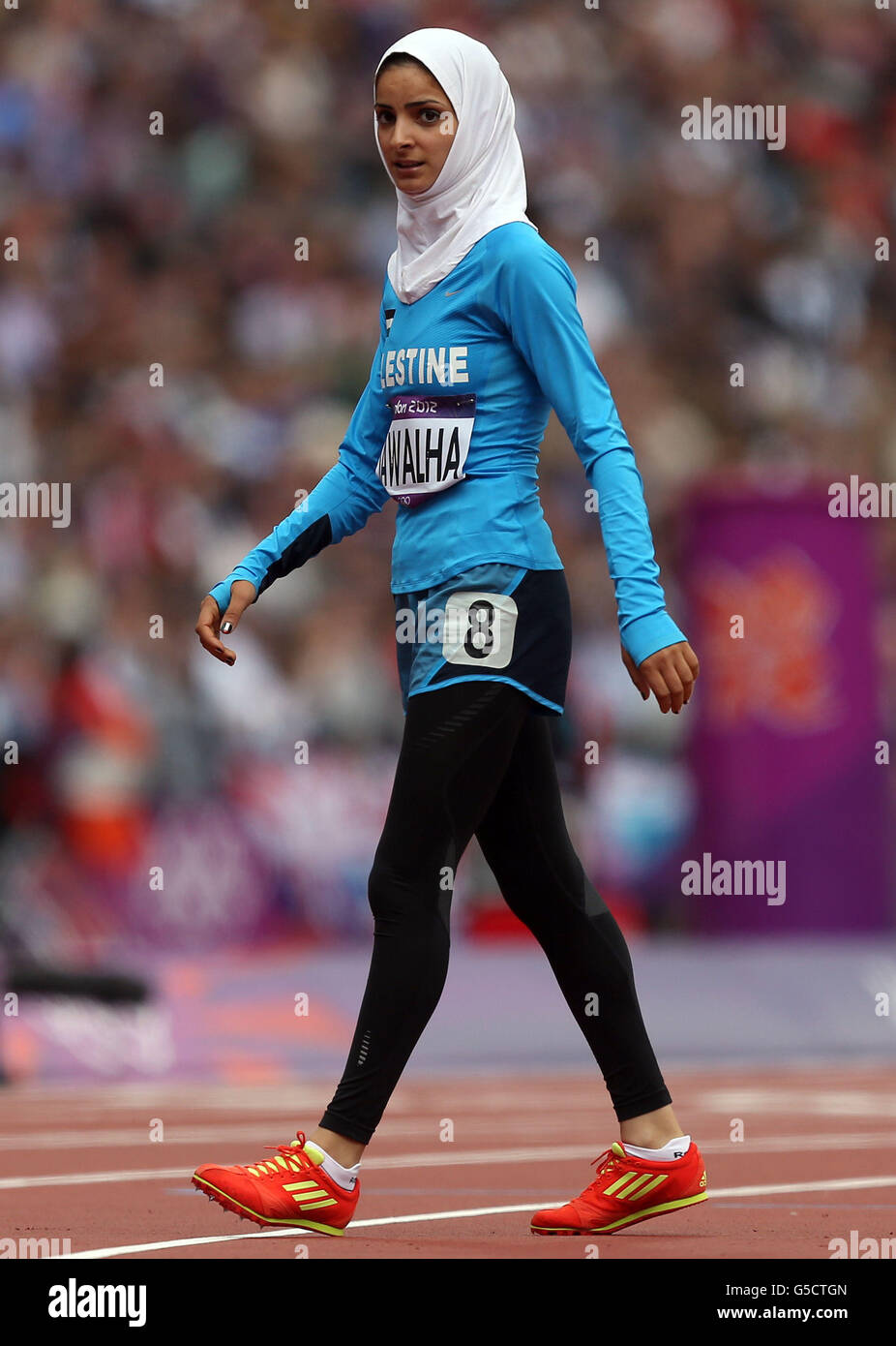 Palestine's Woroud Sawalha leaves the track after competing in the
