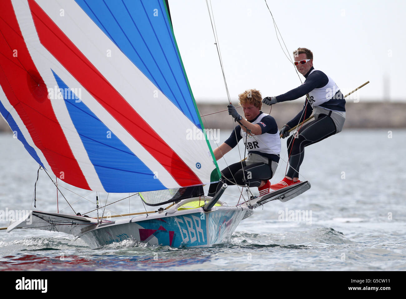 Great Britain's Stevie Morrison and Ben Rhodes compete in the Men's 49er medal race at Weymouth, on the twelfth day of the London 2012 Olympics. Stock Photo